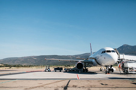 white airplane during daytime thumbnail
