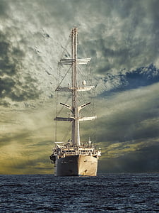 white ship sailing during cloudy day thumbnail