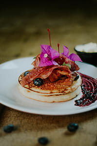 Pancake With Blueberry Toppings on White Ceramic Plate thumbnail