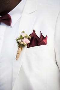 Closeup Photo of Person Wearing White Collared Shirt and Suit thumbnail