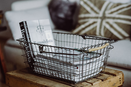 Magazines in a metal basket thumbnail