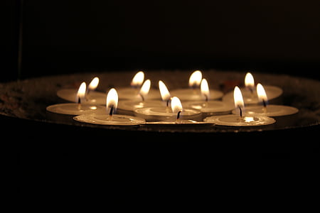 shallow focus photo of tealights thumbnail