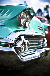 selective focus photography of car hood thumbnail