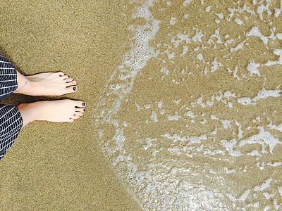 person standing near beach thumbnail
