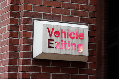 white and red vehicle exiting signage thumbnail