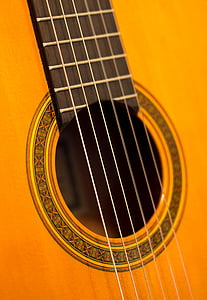 close-up photography of guitar string thumbnail