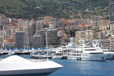 two white yacht near the establishment during daytime thumbnail