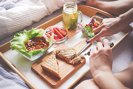 Young Woman Enjoying Morning Breakfast in Bed #2 thumbnail