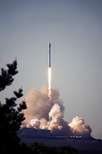 rocket ship launched over smoke thumbnail