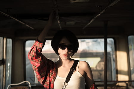 woman standing inside the vehicle thumbnail