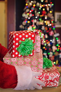 person holding present boxes thumbnail