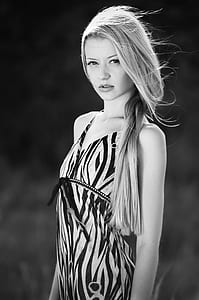 grayscale photo of woman wearing halter dress thumbnail