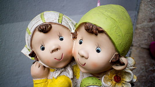 two woman ceramic statues thumbnail