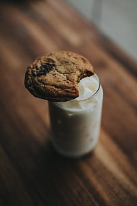 baked cookie on clear drinking glass thumbnail