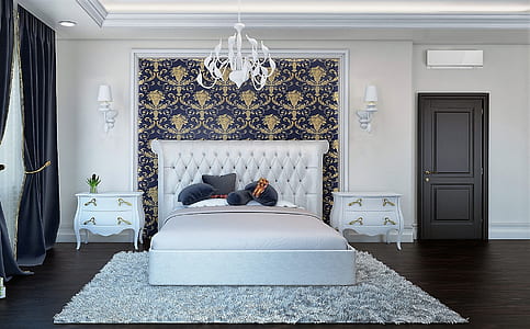 gray bed near close door in a well lit bedroom thumbnail