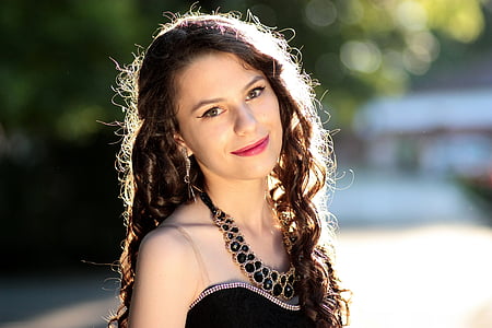 woman wearing black strapless top thumbnail