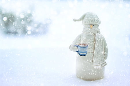 snowman holding mug of coffee thumbnail