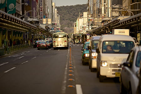 shallow photo of busy road during sunset thumbnail