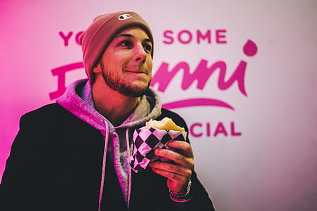 man holding sandwich thumbnail