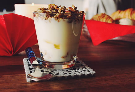 filled cup beside teaspoon thumbnail