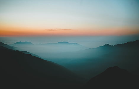 aerial view photography of mountain covered by clouds thumbnail