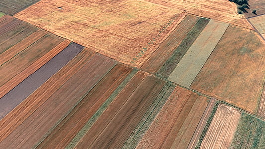 aerial photography of brown plain field thumbnail