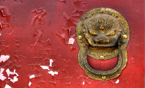 closeup view of brown metal door knocker thumbnail