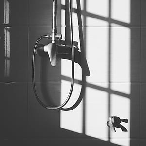 grayscale photo of bathroom thumbnail