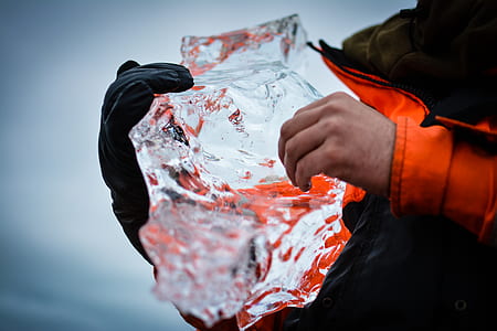person holding ice thumbnail
