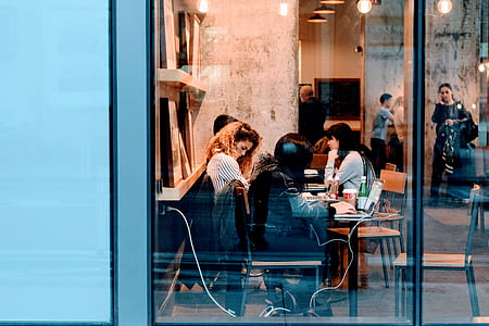 woman sitting inside building thumbnail