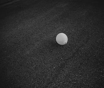 pearl accessory on black surface thumbnail