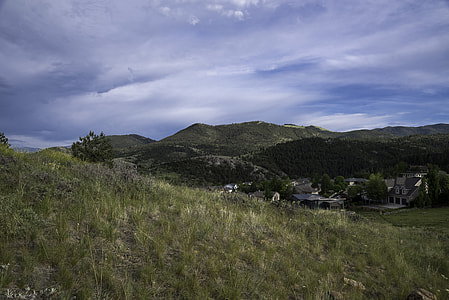 Mountain grasses landscape with hills with clouds and sky in Helena thumbnail