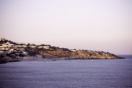 view of buildings near body of water thumbnail