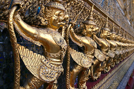 photo of brown metal statues thumbnail