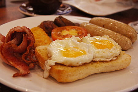 toasted bread with sausages, bacon, and egg thumbnail