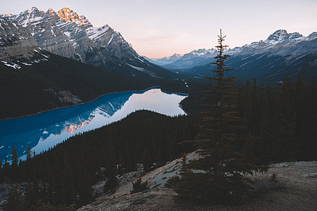 photo of mountains near body of wate thumbnail