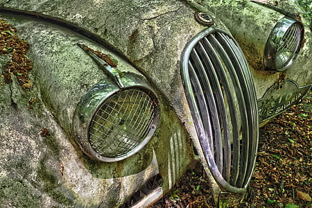 closeup photography of abandoned classic car thumbnail