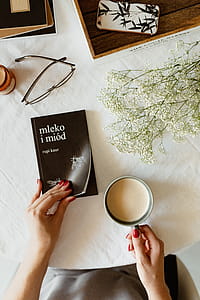 Woman read book and drink coffee thumbnail