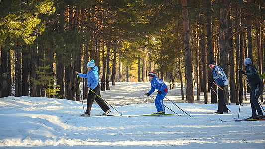 four people snow skiing during daytime thumbnail