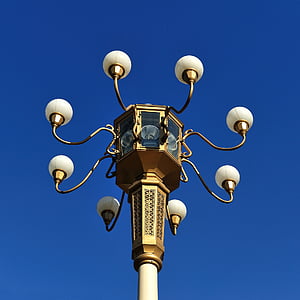 low-angle photography of utility post under clear blue sky thumbnail