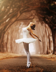 ballerina on concrete road thumbnail