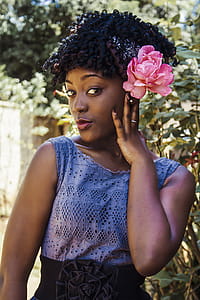 Woman in Purple Sleeveless Top Making Pose Outdoors thumbnail