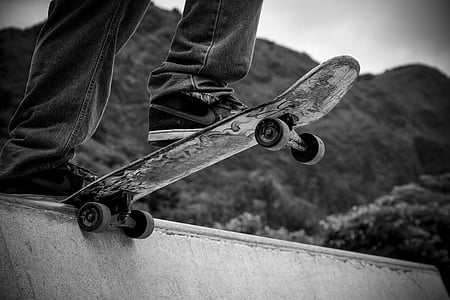 greyscale photography of person skateboarding thumbnail