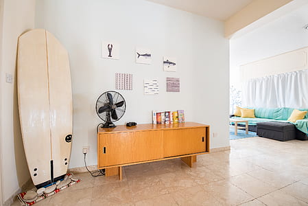 black desk fan on top of sideboard thumbnail