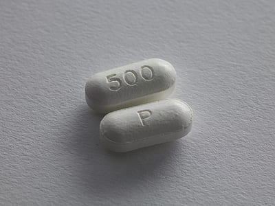 two white caplets thumbnail