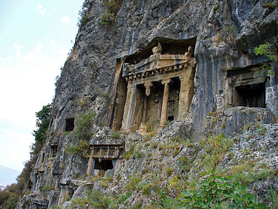 stone shrine at mountain hill side at daytime thumbnail