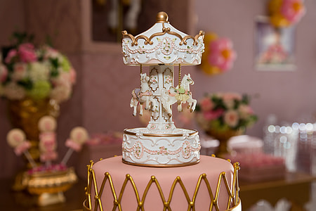 selective focus photography of carousel miniature thumbnail