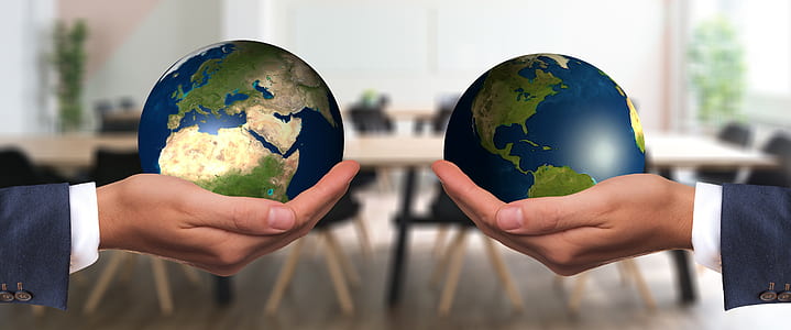 person holding world globe thumbnail