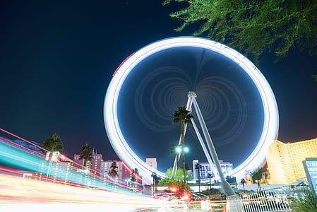 timelapse photography of ferris wheel during nighttime thumbnail