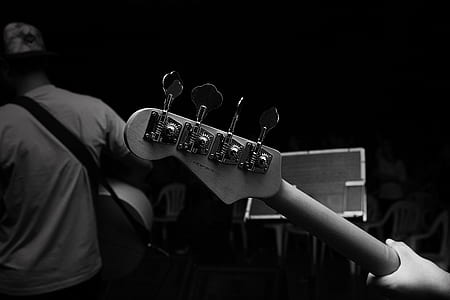 person holding guitar thumbnail